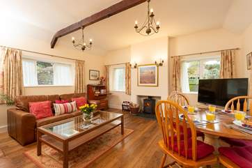 This bright, spacious sitting-room feels very homely.