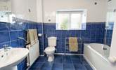 The bathroom is spacious and bright. - Thumbnail Image