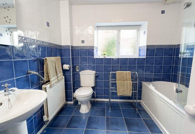 The bathroom is spacious and bright.