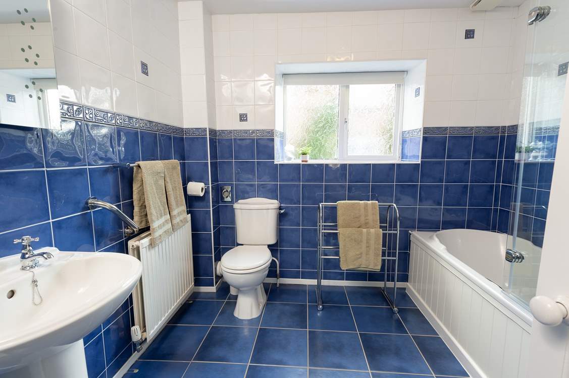 The bathroom is spacious and bright.