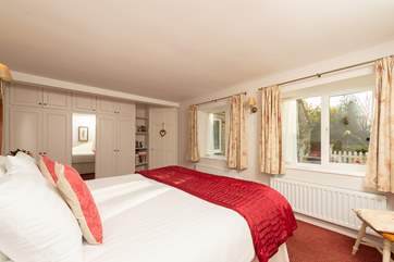 Lie in bed and take in the delightful view of the courtyard.