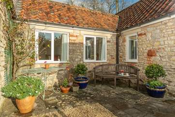 Enjoy your morning coffee in this sun-trap of a courtyard.