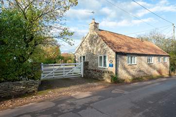 Keep your eyes peeled for the white gate which is the entrance to your private driveway.