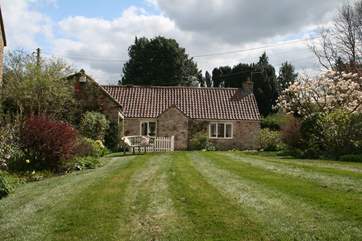 This photograph is taken from the owner's garden but you have private use of the courtyard and since this photo the owner has also created a fenced area of lawn for your use.