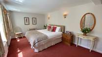 You are assured of peace and relaxation in the main bedroom, complete with a 'zip and link' super-king bed.
