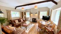 This bright, spacious sitting-room feels very homely.