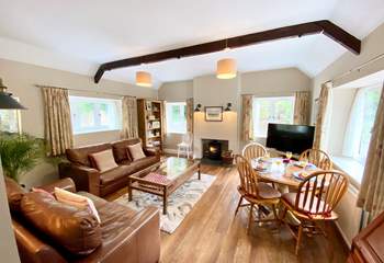 This bright, spacious sitting-room feels very homely.