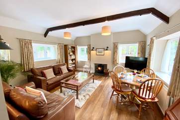 This bright, spacious sitting-room feels very homely.