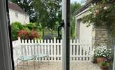 So many of the windows have such pretty views of the courtyard and garden - this is from the kitchen. - Thumbnail Image