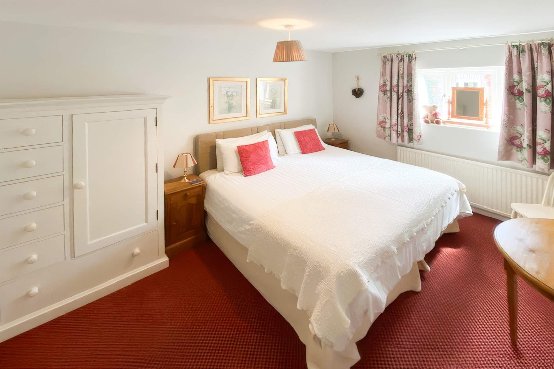 This lovely bright and large bedroom can be configured as a large double bed or two singles.