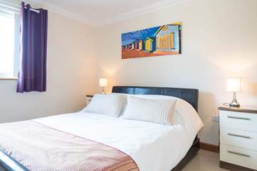 The comfortable second bedroom on the first floor...