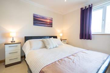 The third bedroom on the first floor overlooks the stunning garden...