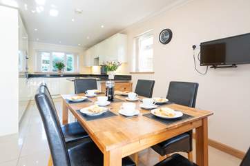 The homely kitchen/dining-room is perfect to spend with all the family.