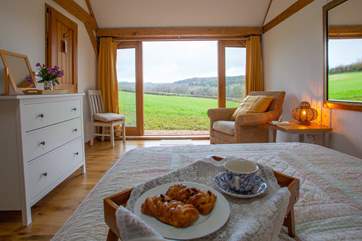 Enjoy breakfast from the comfort of your bed and take in the views.