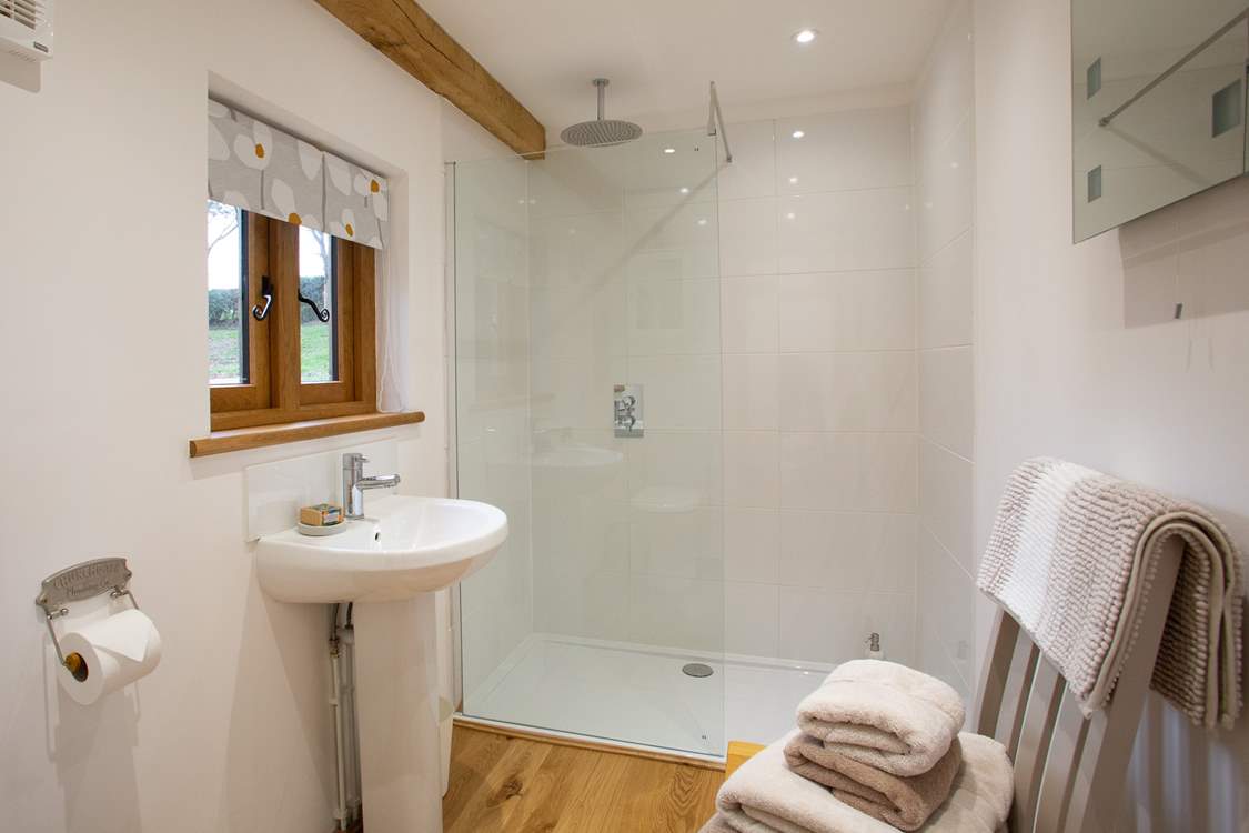 With a large shower.