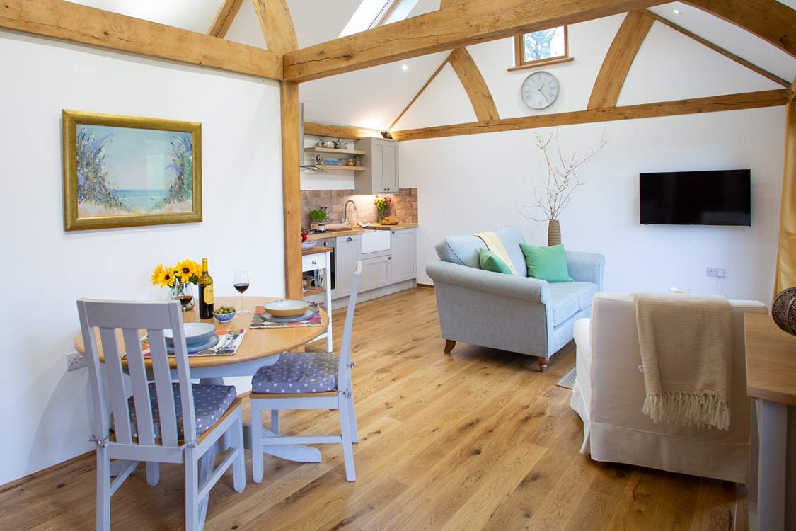 The stylish open plan living area with under-floor heating will keep you cosy whatever the weather.