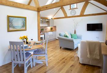 The stylish open plan living area with under-floor heating will keep you cosy whatever the weather.
