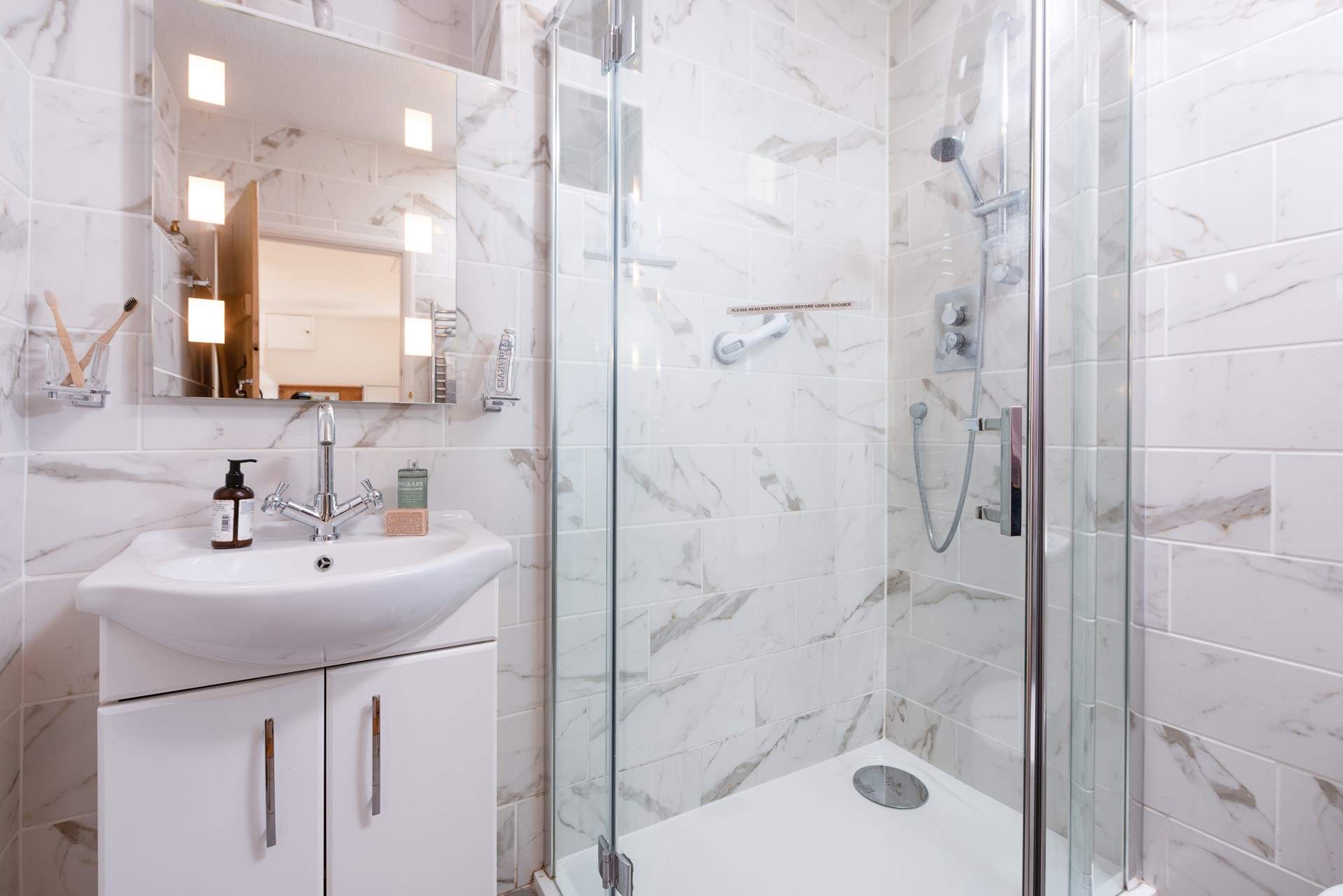 The stylish en suite shower room.
