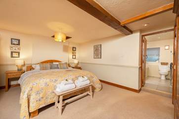 The main bedroom shares a Jack and Jill style en suite with one of the twin bedrooms.