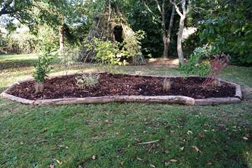 Beautifully landscaped garden with your very own Wigwam to enjoy a outdoor adventure.
