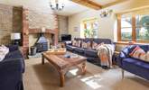 Kick back and relax in the spacious sitting-room. - Thumbnail Image