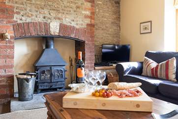 Enjoy a glass of your favourite whilst sat on a choice of comfy sofas in front of the log burner.