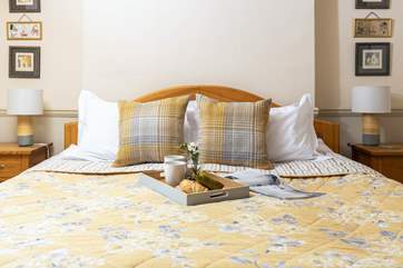 Relax atop the luxurious super-king double bed.