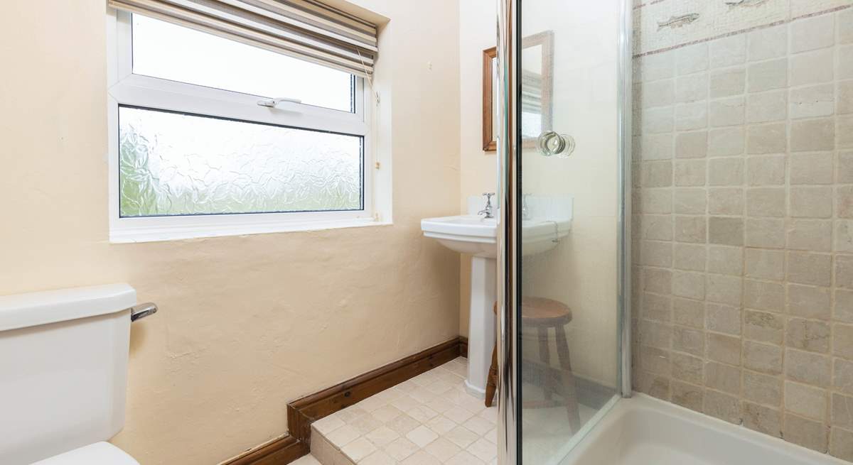 A modern, bright shower room on the first floor.