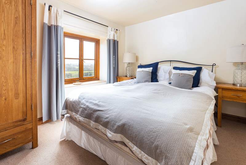 Every bedroom has uninterrupted countryside views, this double bedroom faces over the front of the cottage.