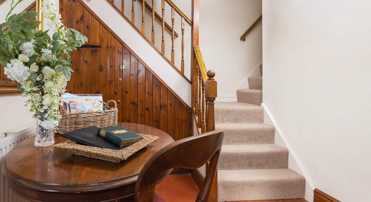 We love the character of the original floors and dual staircase leading up to the bedrooms.