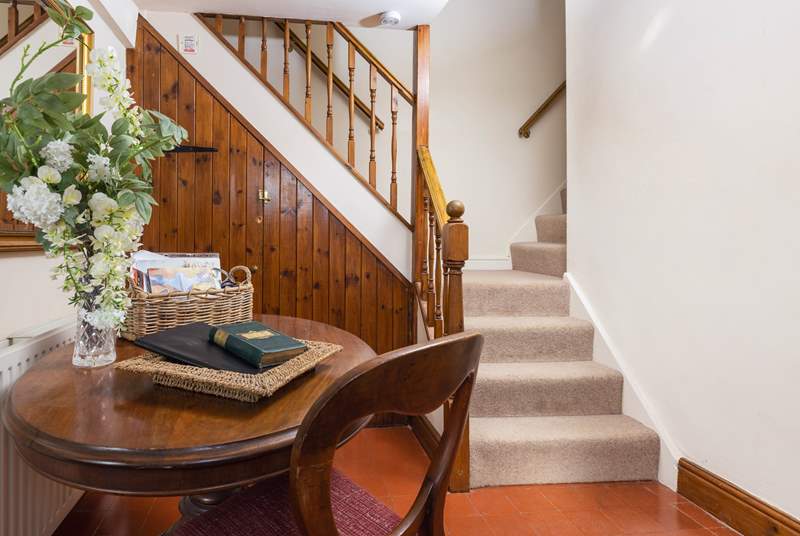 We love the character of the original floors and dual staircase leading up to the bedrooms.