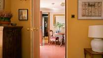 The living and dining both connected from the main hallway at the front of the house
