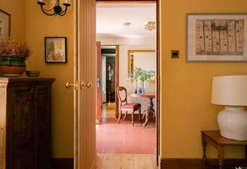 The living and dining both connected from the main hallway at the front of the house