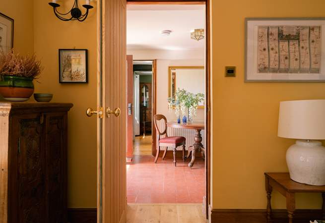 The living and dining both connected from the main hallway at the front of the house