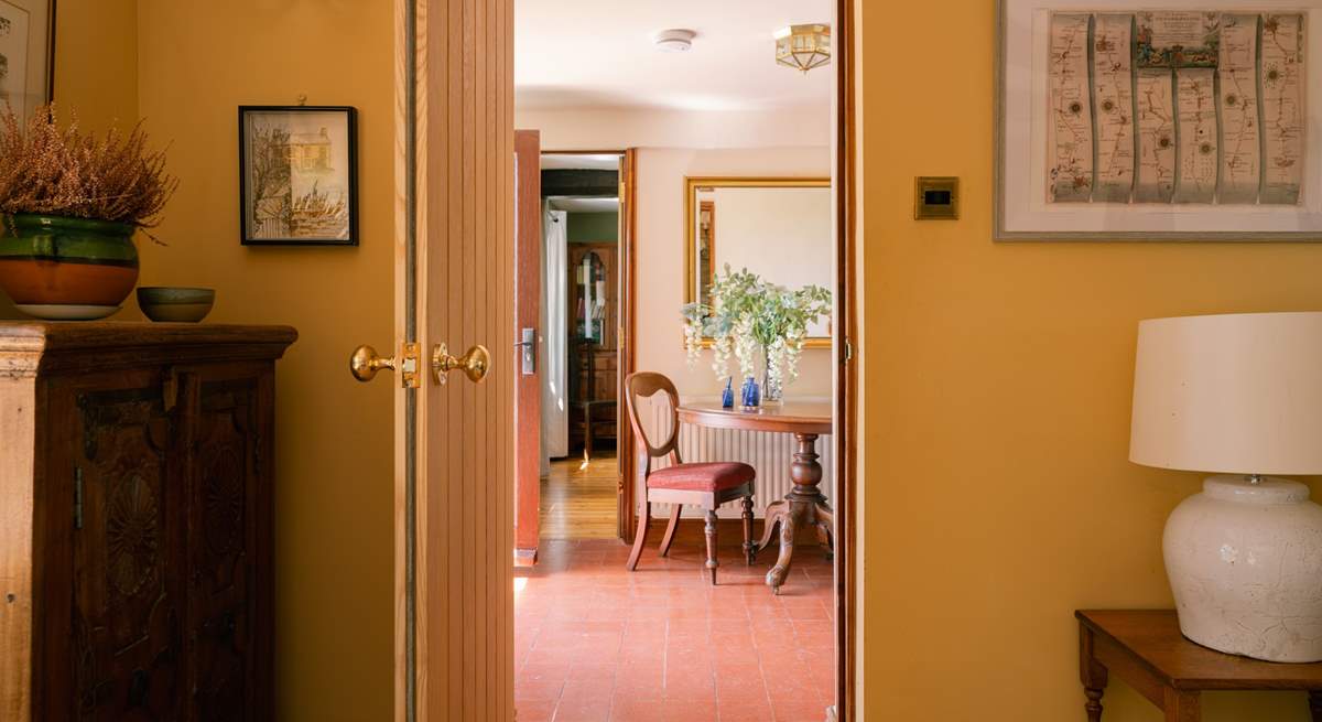 The living and dining both connected from the main hallway at the front of the house
