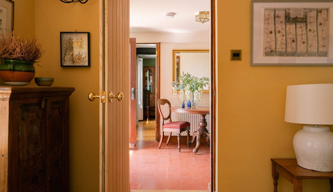 The living and dining both connected from the main hallway at the front of the house
