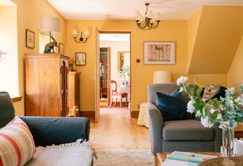 The sitting room is flooded with light