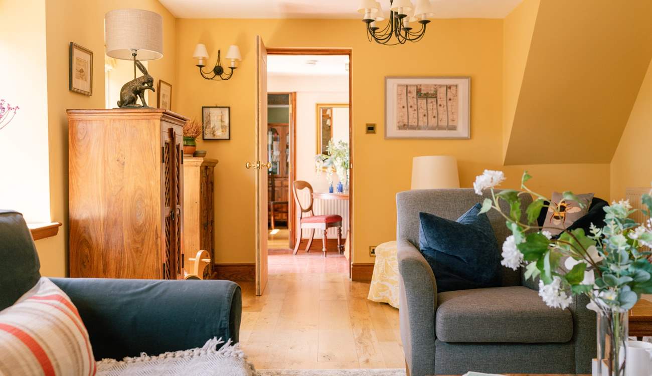 The sitting room is flooded with light