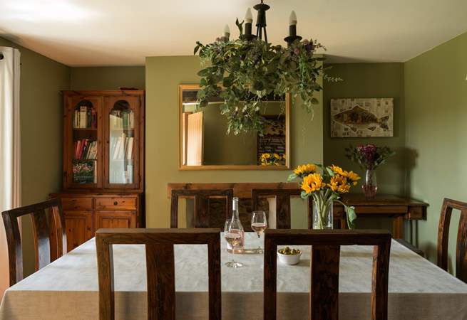 Striking formal dining room for 8 with beautiful feature fireplace