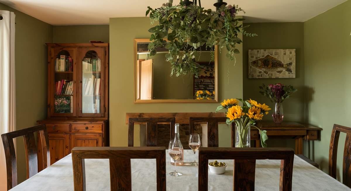 Striking formal dining room for 8 with beautiful feature fireplace