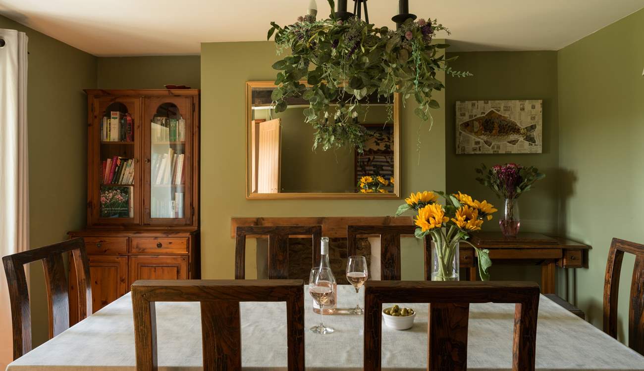 Striking formal dining room for 8 with beautiful feature fireplace