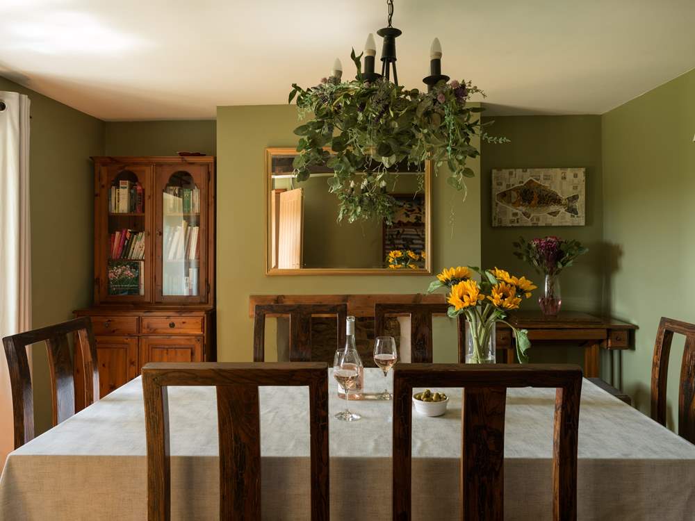 Striking formal dining room for 8 with beautiful feature fireplace