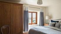 Every bedroom has uninterrupted countryside views, this double bedroom looks out over the front of the cottage.