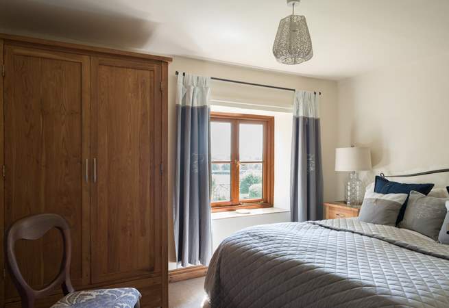 Every bedroom has uninterrupted countryside views, this double bedroom faces over the front of the cottage.