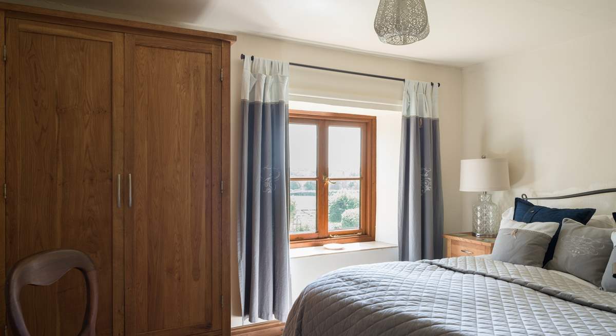 Every bedroom has uninterrupted countryside views, this double bedroom faces over the front of the cottage.