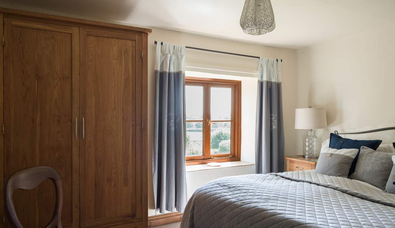 Every bedroom has uninterrupted countryside views, this double bedroom faces over the front of the cottage.