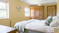 The large twin room has a shared en suite bathroom with the main bedroom.