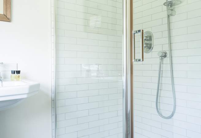 Bright upstairs shower room is additional to the main bathroom