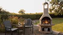 As evening comes why not whip up a home-made pizza in the bespoke outdoor oven!