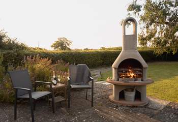 As evening comes why not whip up a home-made pizza in the bespoke outdoor oven!